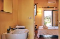A bed or beds in a room at Agriturismo San Sano