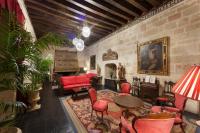 A seating area at Posada Real Castillo del Buen Amor