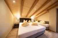 Posteľ alebo postele v izbe v ubytovaní Hotel Garni Schönblick