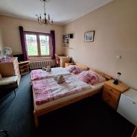 Postel nebo postele na pokoji v ubytování Pension Lukas