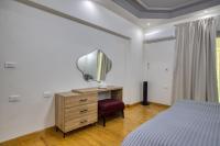 Postel nebo postele na pokoji v ubytování Cairo Central & modern apartment