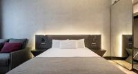 A bed or beds in a room at Ilunion Bel-Art