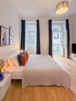 Postel nebo postele na pokoji v ubytování TurnKey I Wenceslas Square Apartments