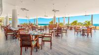 Un restaurante u otro lugar para comer en GR Solaris Lighthouse - All Inclusive