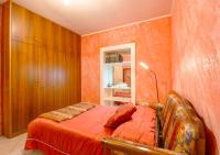 A bed or beds in a room at La Tela di Penelope