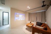 John's Apartmentにあるテレビまたはエンターテインメントセンター