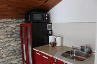 Kuchyň nebo kuchyňský kout v ubytování Guest House Lila