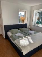 Postel nebo postele na pokoji v ubytování Ferienoberwohnung in Villa Pesca