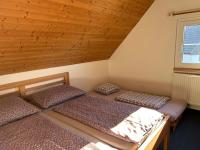 Postel nebo postele na pokoji v ubytování Vila 66 - Čistá v Krkonoších