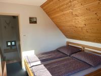 Postel nebo postele na pokoji v ubytování Vila 66 - Čistá v Krkonoších