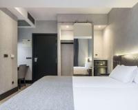 A bed or beds in a room at Ilunion Bel-Art