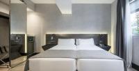 A bed or beds in a room at Ilunion Bel-Art