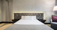 A bed or beds in a room at Ilunion Bel-Art