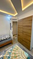 Postel nebo postele na pokoji v ubytování Une maison houmt souk djerba