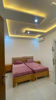 Postel nebo postele na pokoji v ubytování Une maison houmt souk djerba