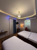 Postel nebo postele na pokoji v ubytování La Vien Hotel Old City