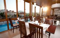 Bazén v ubytování Aes Club Hotel nebo v jeho okolí