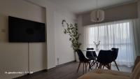 TV a/nebo společenská místnost v ubytování Beach apartment's