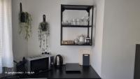 Kuchyň nebo kuchyňský kout v ubytování Beach apartment's