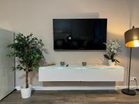 TV a/nebo společenská místnost v ubytování Ferienwohnung Nr 124 Sehnsucht-Zingst