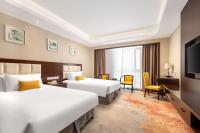 ShangHai LuAn Garden Hotelにあるベッド