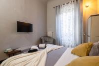 Łóżko lub łóżka w pokoju w obiekcie TORNABUONI APARTMENT - in OLD TOWN center FIRENZE