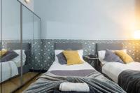 Łóżko lub łóżka w pokoju w obiekcie TORNABUONI APARTMENT - in OLD TOWN center FIRENZE