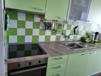Kuchyň nebo kuchyňský kout v ubytování Apartment Mila