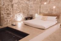 Posteľ alebo postele v izbe v ubytovaní La Cammara al Duomo Lecce Luxury Apartment