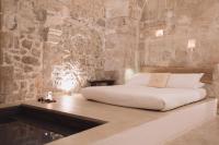 Posteľ alebo postele v izbe v ubytovaní La Cammara al Duomo Lecce Luxury Apartment