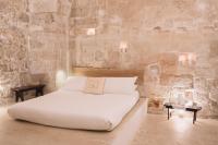 Posteľ alebo postele v izbe v ubytovaní La Cammara al Duomo Lecce Luxury Apartment