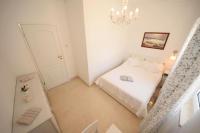 Posteľ alebo postele v izbe v ubytovaní Apartments Lucky