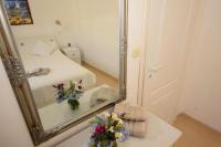 Posteľ alebo postele v izbe v ubytovaní Apartments Lucky