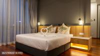 Harmony Luxury Suites At The Manor KLCCにあるベッド