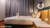 Harmony Luxury Suites At The Manor KLCCにあるベッド