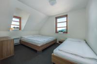 Postel nebo postele na pokoji v ubytování Horský Apartmán Říčky