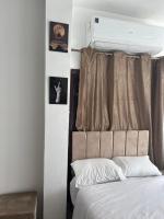 Postel nebo postele na pokoji v ubytování Sola Pyramids inn
