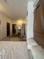 Postel nebo postele na pokoji v ubytování Sola Pyramids inn