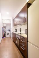 A kitchen or kitchenette at Ronda Sant Pere Private City Center 3Bedroom Suite C