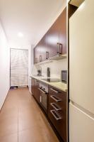 A kitchen or kitchenette at Ronda Sant Pere Private City Center 3Bedroom Suite C