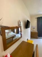 Postel nebo postele na pokoji v ubytování Maavaharu Guest House Himmafushi