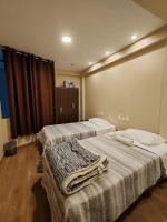 Hotel Sol de Marconaにあるベッド