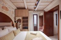 Posteľ alebo postele v izbe v ubytovaní Philikon Luxury Suites