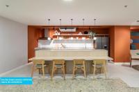 a kitchen with a table and four chairs at Flat Casa Mauá in Rio de Janeiro