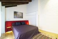 A bed or beds in a room at Valencia Luxury - Boutique Redonda