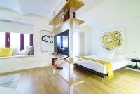 A bed or beds in a room at Valencia Luxury - Boutique Redonda