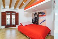 A bed or beds in a room at Valencia Luxury - Boutique Redonda