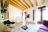 A television and/or entertainment centre at Valencia Luxury - Boutique Redonda