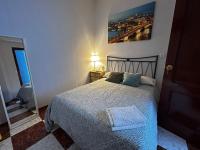 Postel nebo postele na pokoji v ubytování Santa Isabel Low Cost Rooms in private house