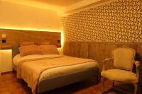 Łóżko lub łóżka w pokoju w obiekcie Appartement familial au bord de la Marne, jardin tropical , piscine, tennis, terrasse, parking gratuit proche Disneyland